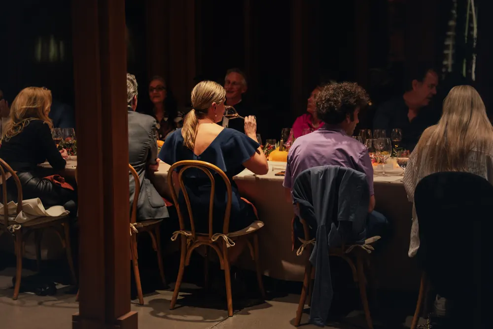 guests at a busy dinner table